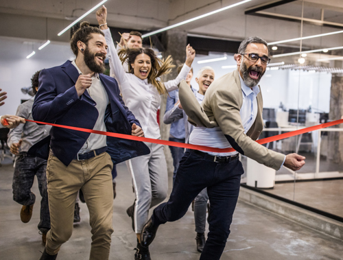 People running through a ribbon